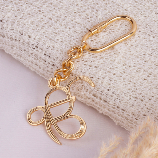 Elita Decorative Gold-Plated Finish Ek Onkar Charm Keychain with Chain Link Design Brass